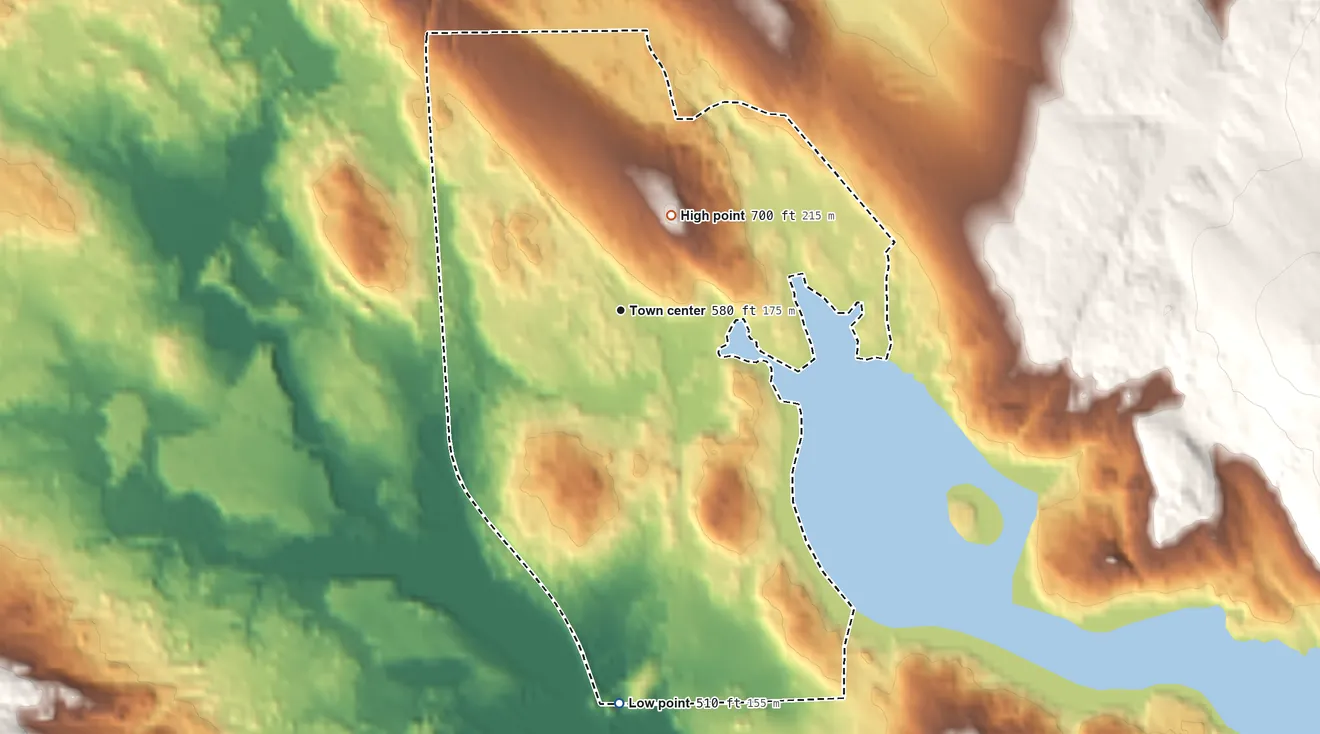 Topographic elevation map of Sanbornville, New Hampshire, shaded from 510 ft on the south side to 700 ft on the northeast side