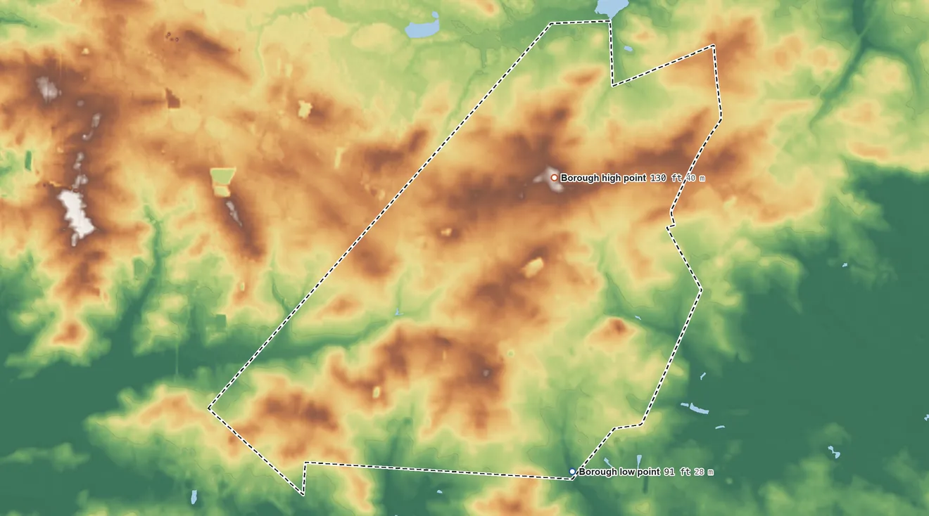 Topographic elevation map of Buena, New Jersey, shaded from 91 ft on the southeast side to 130 ft on the north side