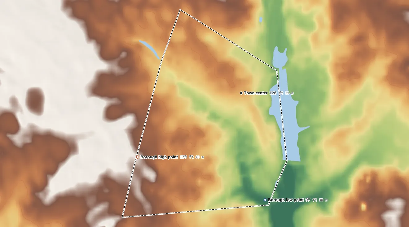 Topographic elevation map of Elmer, New Jersey, shaded from 97 ft on the south side to 130 ft on the southwest side