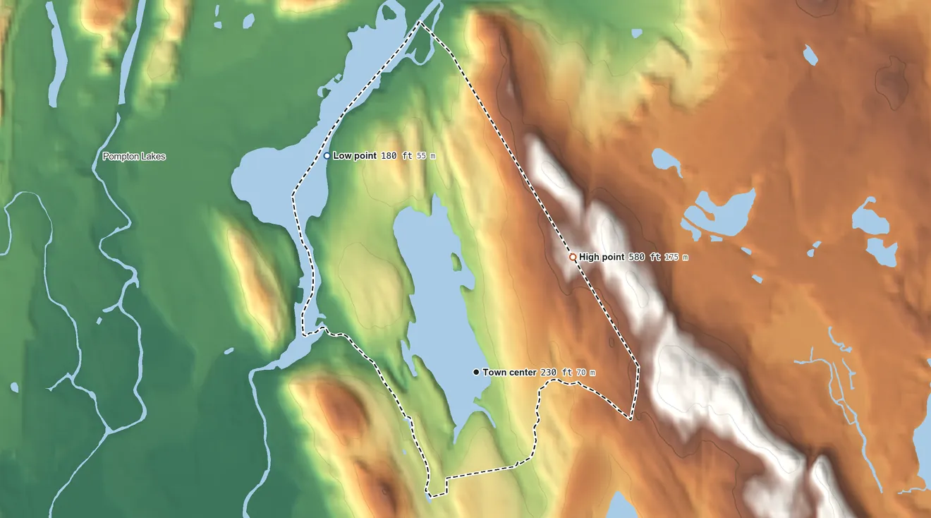 Topographic elevation map of Pines Lake, New Jersey, shaded from 180 ft on the northwest side to 580 ft on the northeast side