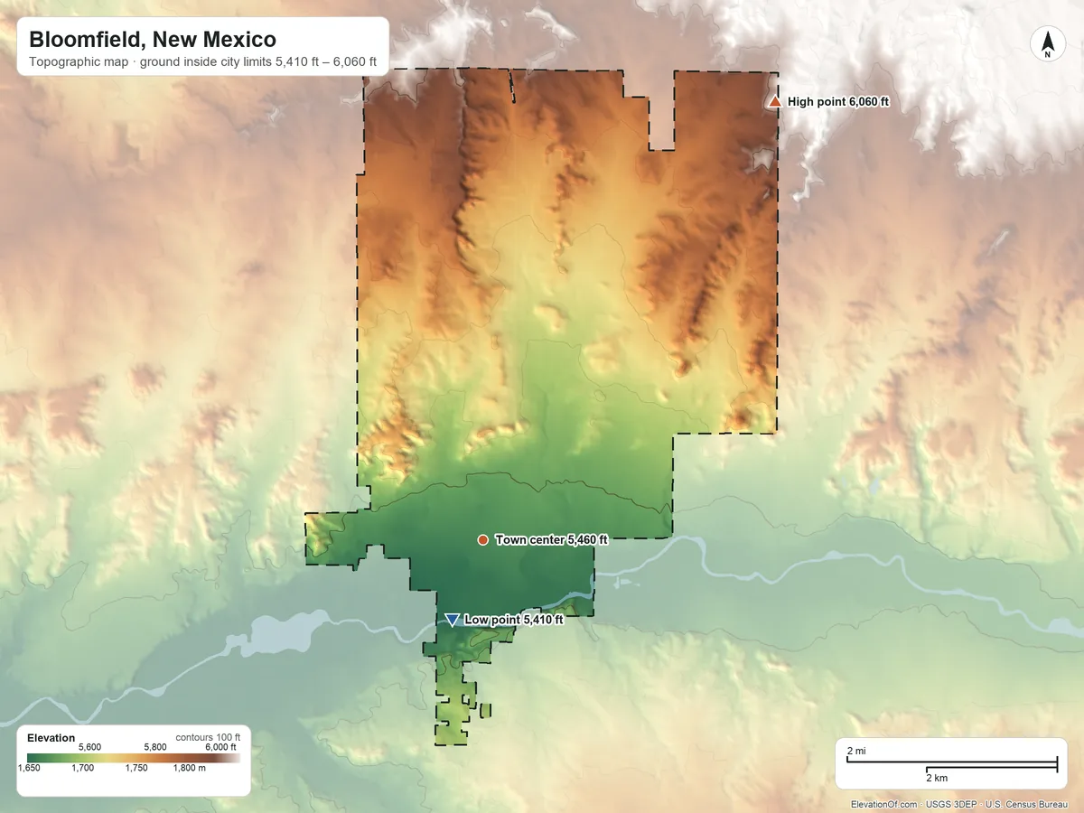 Topographic elevation map of Bloomfield, New Mexico, shaded from 5,410 ft on the south side to 6,060 ft on the northeast side