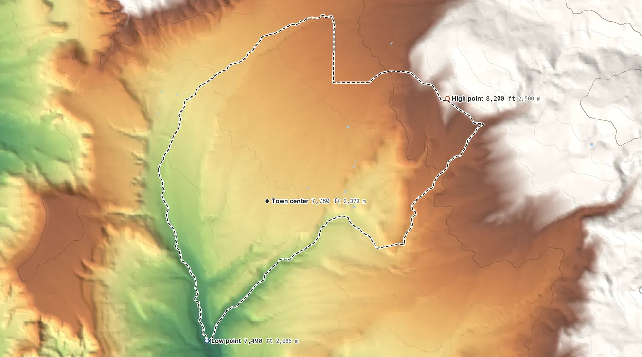 Topographic elevation map of Canjilon, New Mexico, shaded from 7,490 ft on the southwest side to 8,200 ft at the foot of the Tusas Mountains