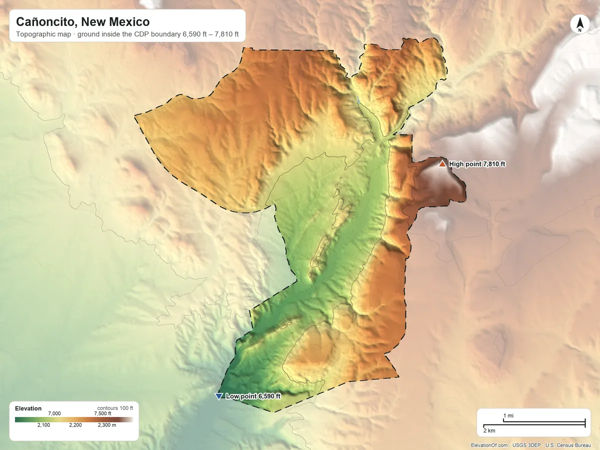 Topographic elevation map of Cañoncito, New Mexico, shaded from 6,590 ft on the south side to 7,810 ft on the east side