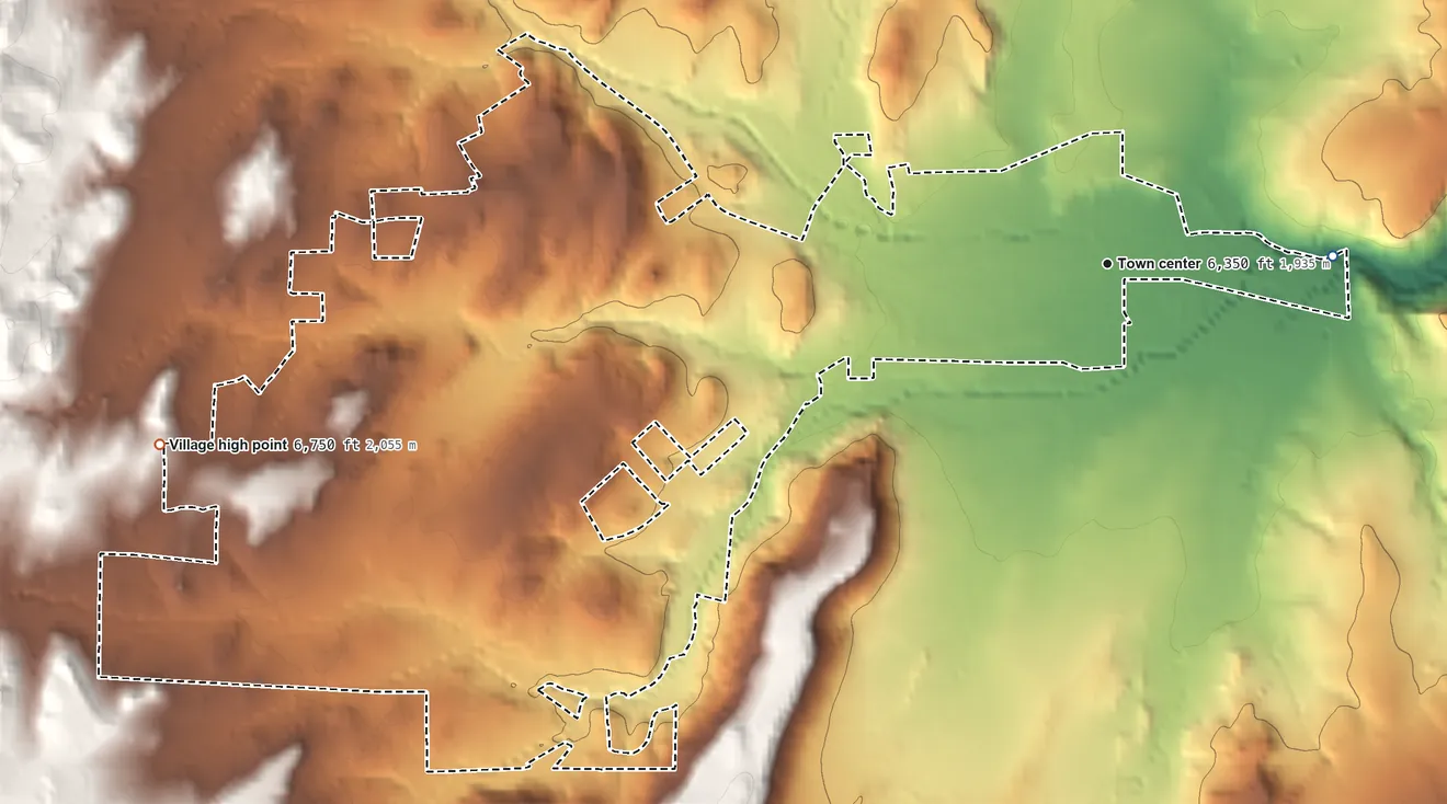 Topographic elevation map of Capitan, New Mexico, shaded from 6,290 ft on the east side to 6,750 ft at the foot of the Vera Cruz Mountains