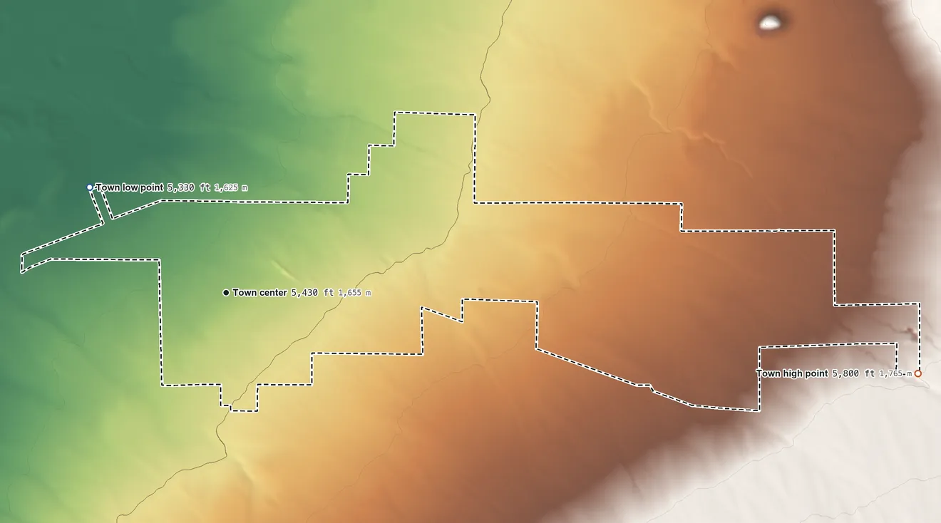 Topographic elevation map of Carrizozo, New Mexico, shaded from 5,330 ft on the northwest side to 5,800 ft on the east side