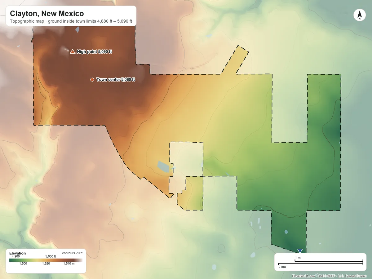 Topographic elevation map of Clayton, New Mexico, shaded from 4,880 ft on the southeast side to 5,090 ft near the middle