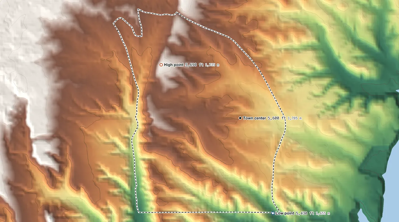 Topographic elevation map of Cochiti Lake, New Mexico, shaded from 5,430 ft on the south side to 5,690 ft on the northwest side