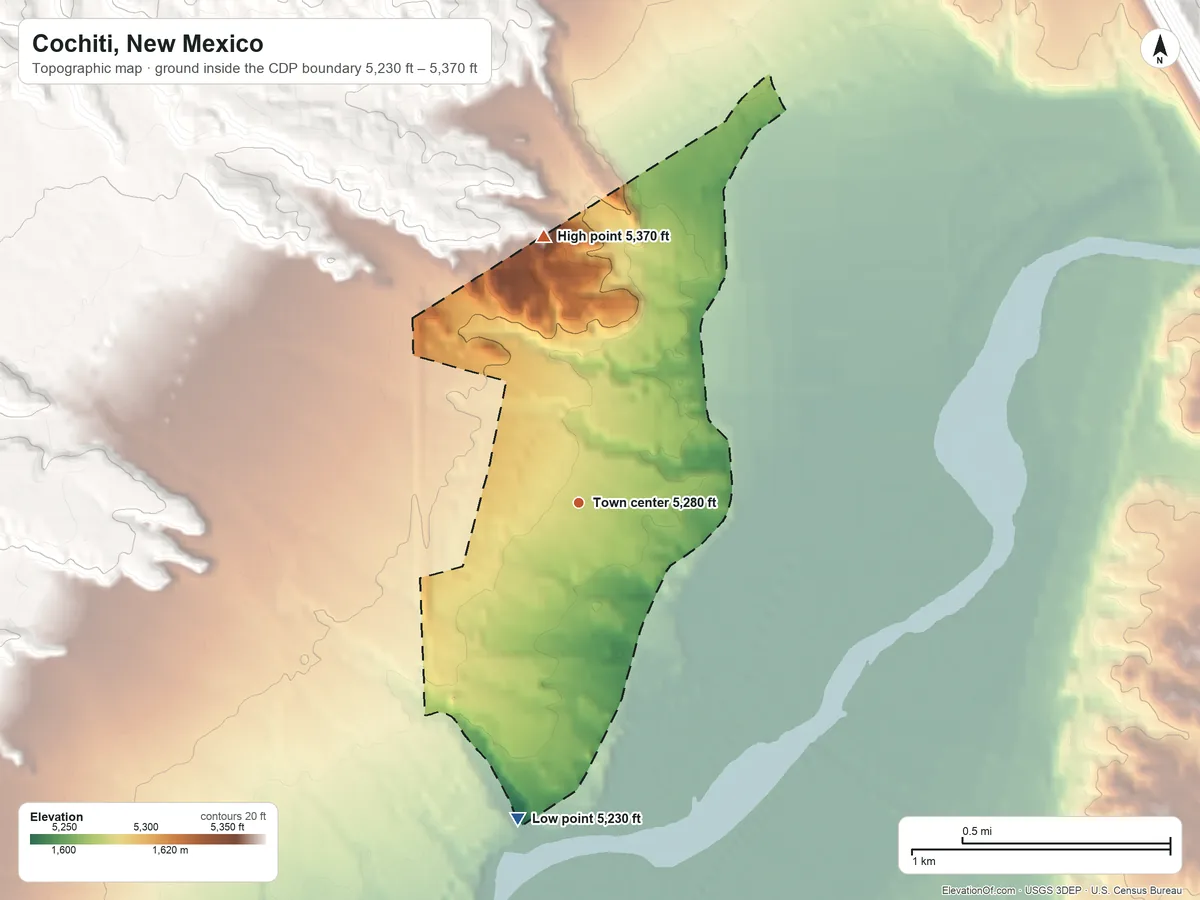 Topographic elevation map of Cochiti, New Mexico, shaded from 5,230 ft on the south side to 5,370 ft at the foot of the San Miguel Mountains