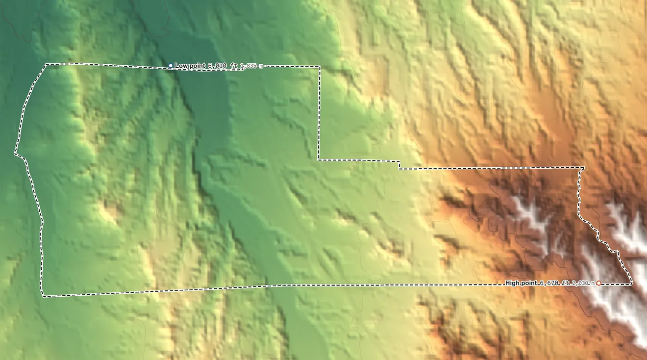 Topographic elevation map of Cuyamungue Grant, New Mexico, shaded from 6,010 ft on the northwest side to 6,670 ft on the southeast side