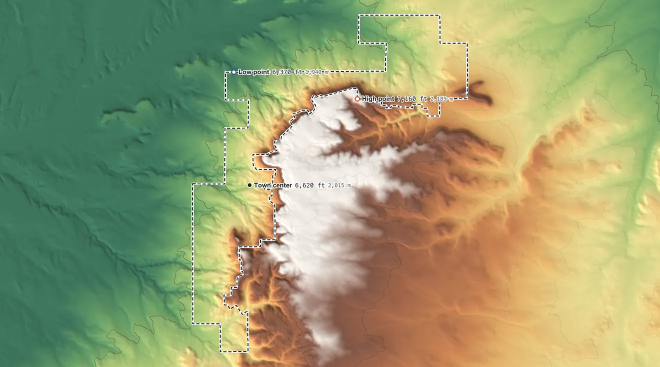 Topographic elevation map of Deer Canyon, New Mexico, shaded from 6,370 ft on the north side to 7,160 ft on the northeast side