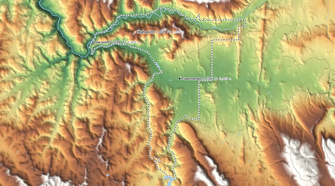 Topographic elevation map of Dulce, New Mexico, shaded from 6,600 ft on the northwest side to 7,860 ft on the northwest side