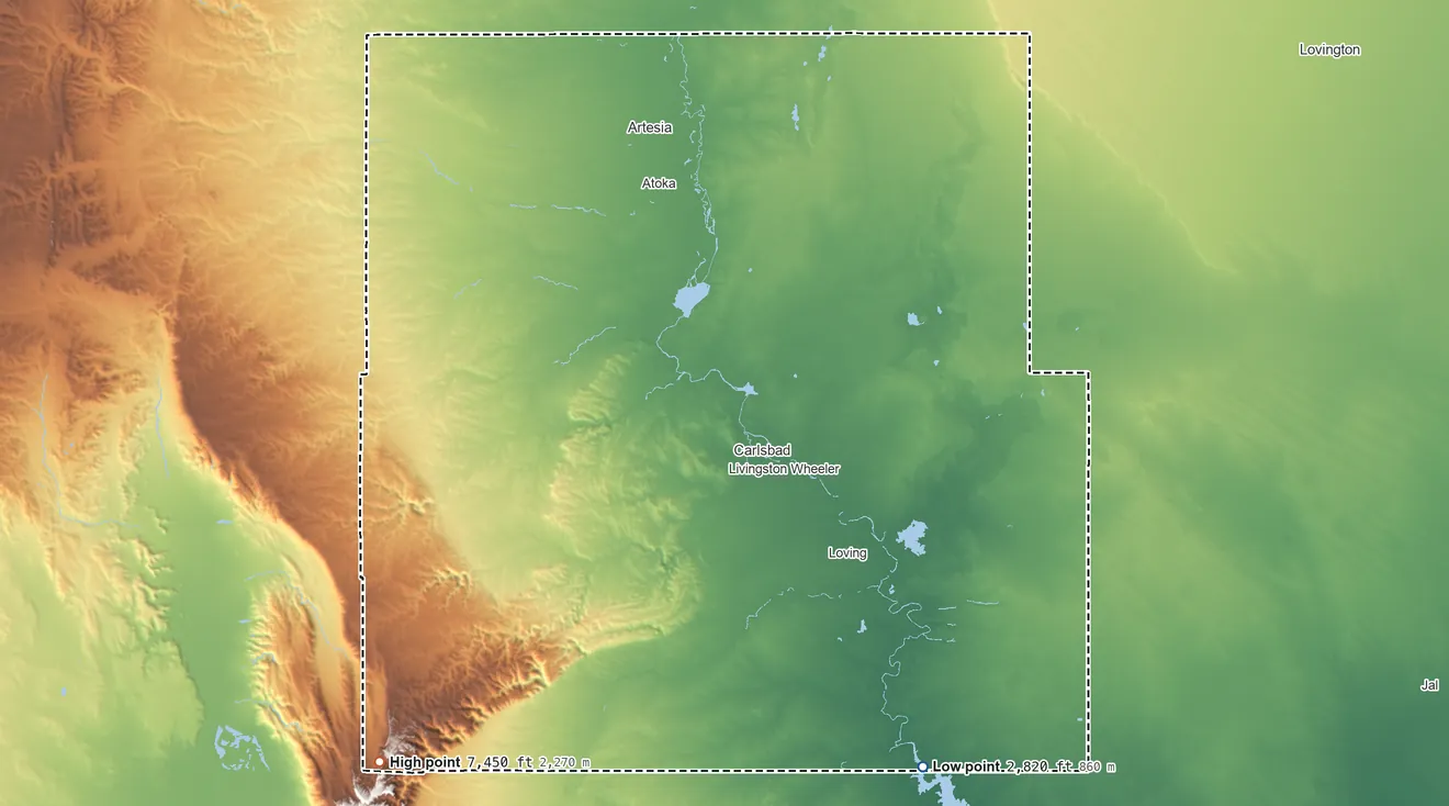 Topographic elevation map of Eddy County, New Mexico, shaded from 2,820 ft on the southeast side to 7,450 ft on the southwest side