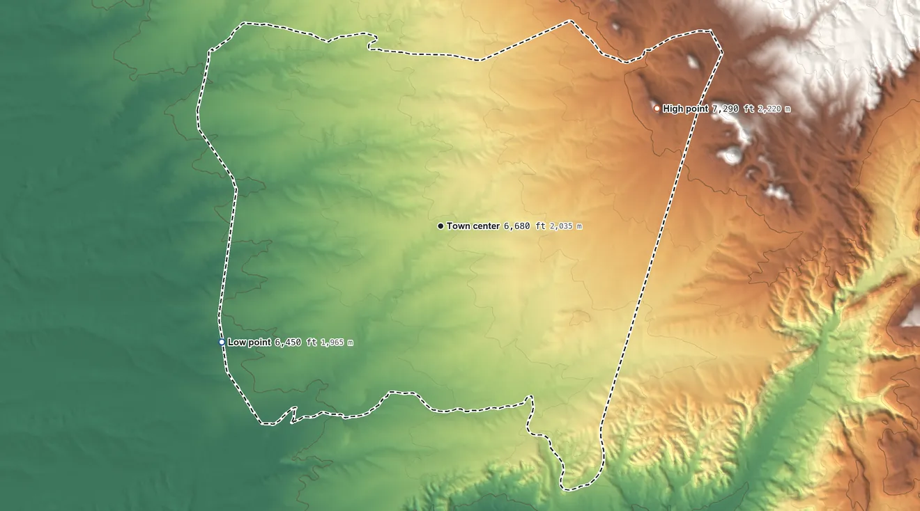 Topographic elevation map of Eldorado at Santa Fe, New Mexico, shaded from 6,450 ft on the southwest side to 7,290 ft at the foot of the Cerrillos Hills