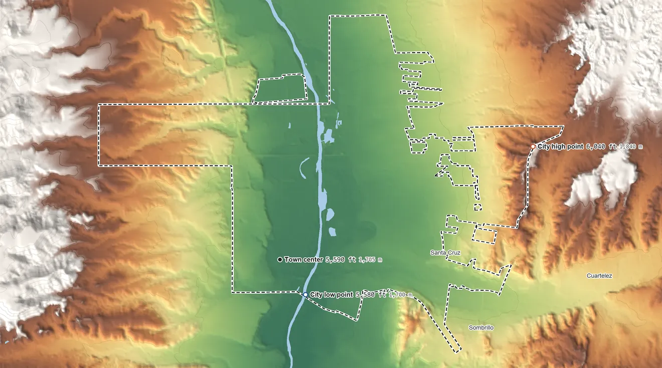 Topographic elevation map of Española, New Mexico, shaded from 5,580 ft near the middle to 6,040 ft on the northeast side