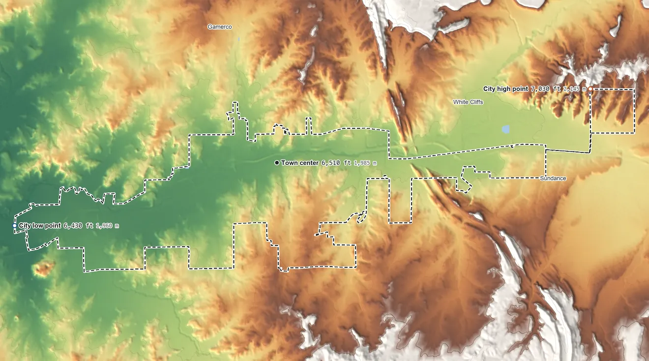 Topographic elevation map of Gallup, New Mexico, shaded from 6,430 ft on the west side to 7,030 ft on the east edge, below higher ground just outside