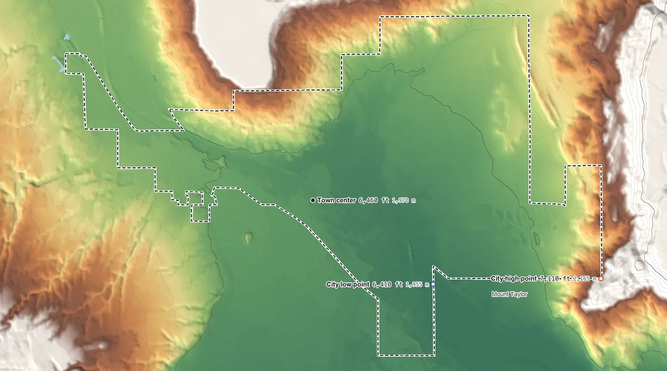 Topographic elevation map of Grants, New Mexico, shaded from 6,410 ft on the southeast side to 7,110 ft at the foot of the San Mateo Mountains