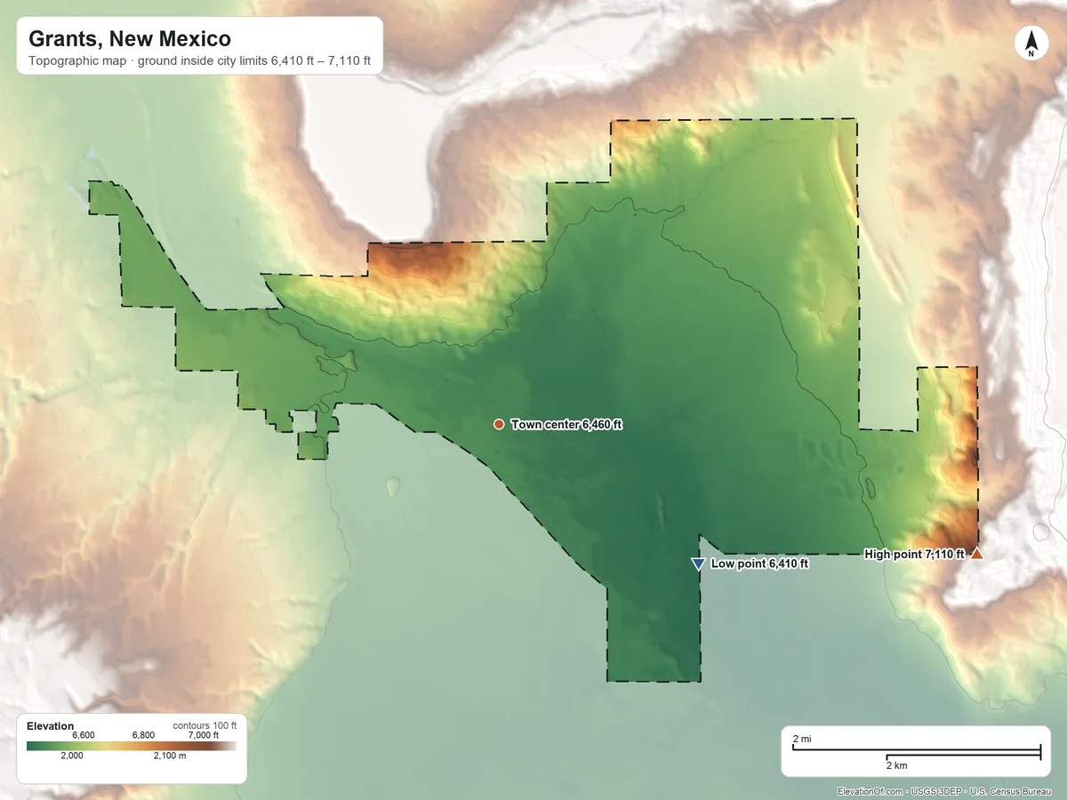 Topographic elevation map of Grants, New Mexico, shaded from 6,410 ft on the southeast side to 7,110 ft at the foot of the San Mateo Mountains