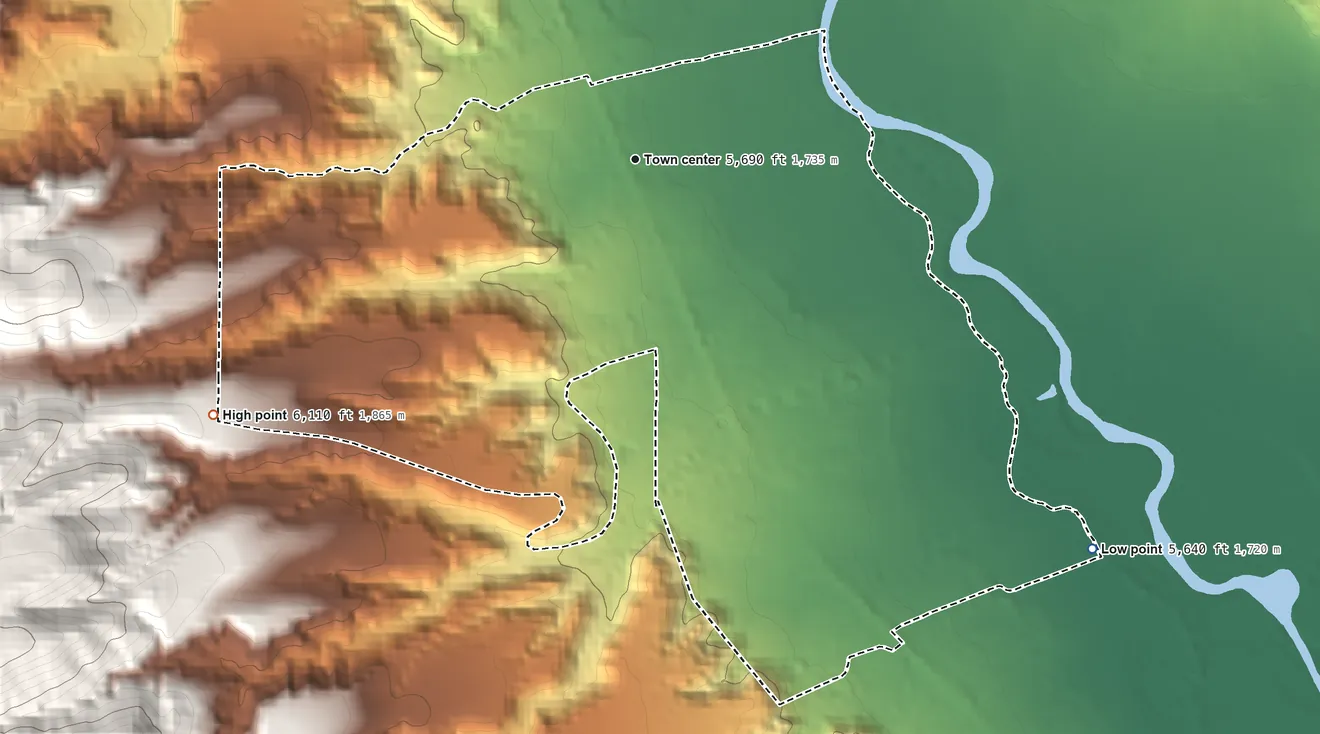 Topographic elevation map of Hernandez, New Mexico, shaded from 5,640 ft on the southeast side to 6,110 ft on the southwest edge, below higher ground just outside