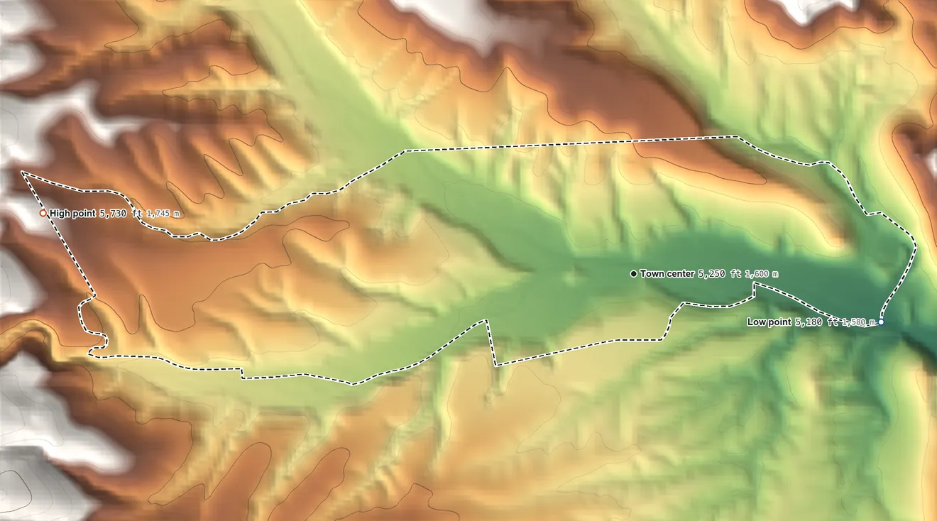 Topographic elevation map of Hillsboro, New Mexico, shaded from 5,180 ft on the east side to 5,730 ft at the foot of the Mimbres Mountains