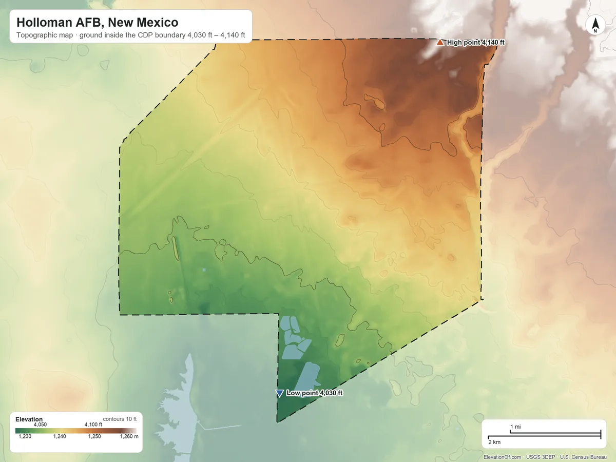 Topographic elevation map of Holloman AFB, New Mexico, shaded from 4,030 ft on the southwest side to 4,140 ft on the north side