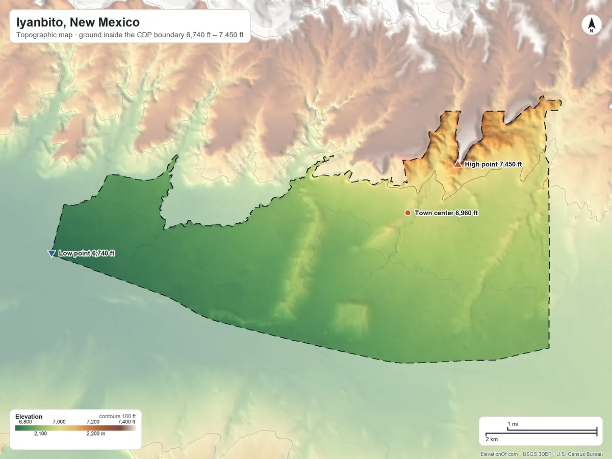 Topographic elevation map of Iyanbito, New Mexico, shaded from 6,740 ft on the west side to 7,450 ft on the northeast edge, below higher ground just outside