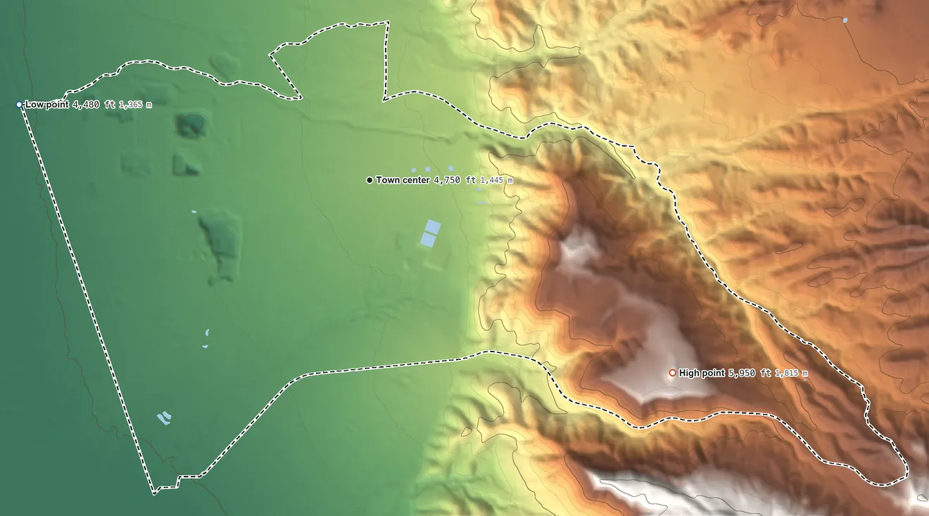 Topographic elevation map of La Luz, New Mexico, shaded from 4,480 ft on the west side to 5,950 ft at the foot of the Coyote Hills