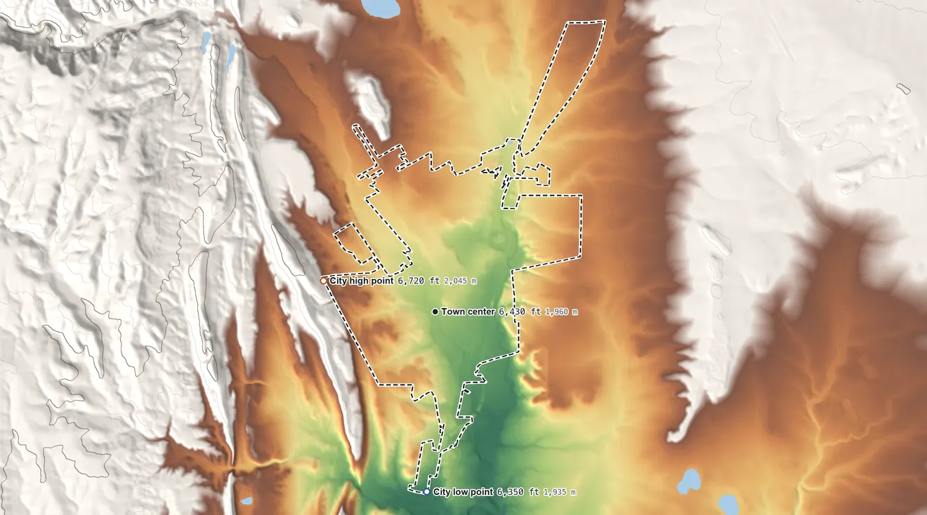 Topographic elevation map of Las Vegas, New Mexico, shaded from 6,350 ft on the south side to 6,720 ft on the west edge, below higher ground just outside