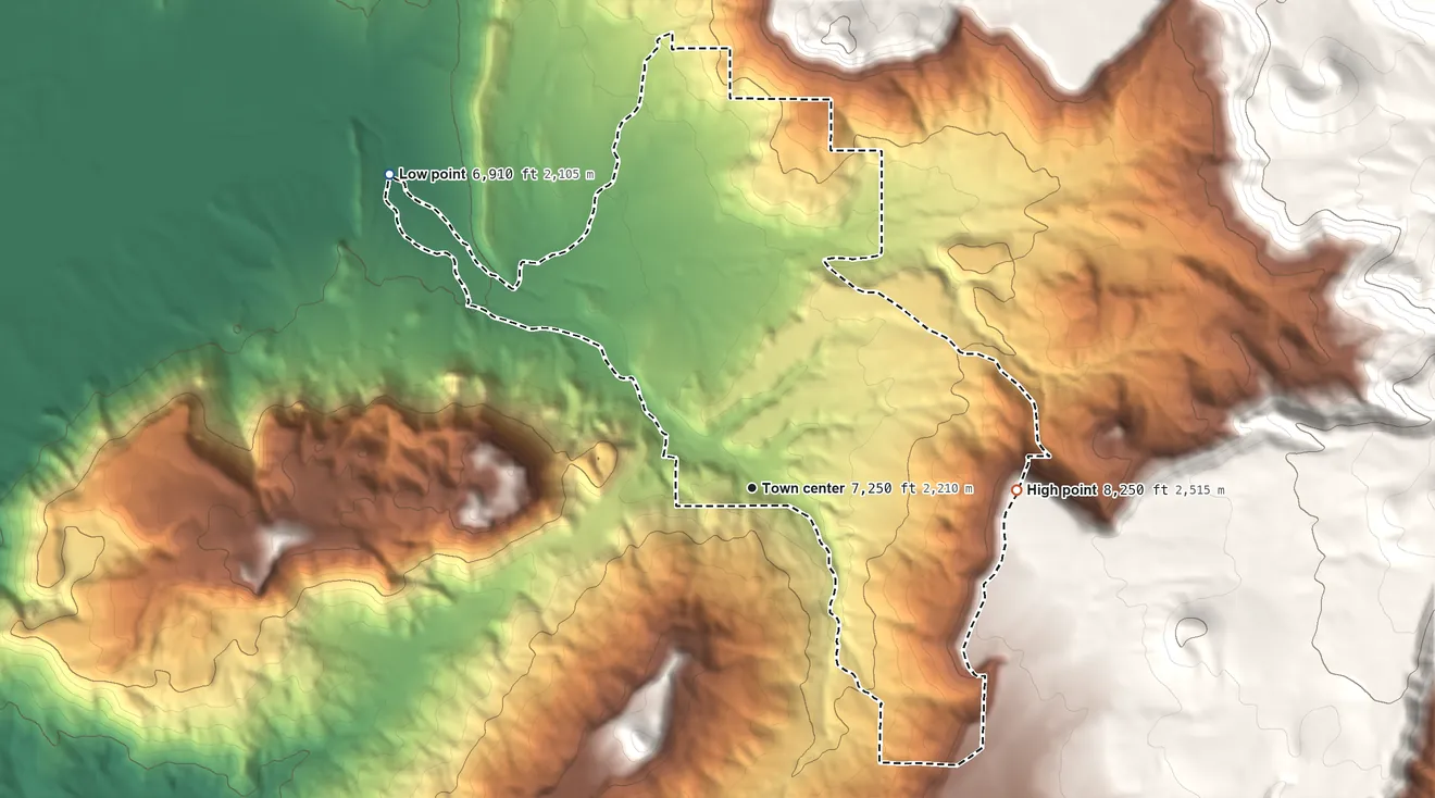 Topographic elevation map of Lobo Canyon, New Mexico, shaded from 6,910 ft on the northwest side to 8,250 ft at the foot of the San Mateo Mountains