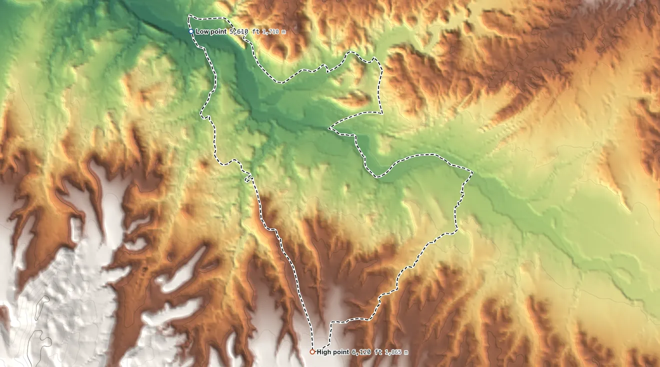 Topographic elevation map of Los Cerrillos, New Mexico, shaded from 5,610 ft on the northwest side to 6,120 ft at the foot of the Ortiz Mountains