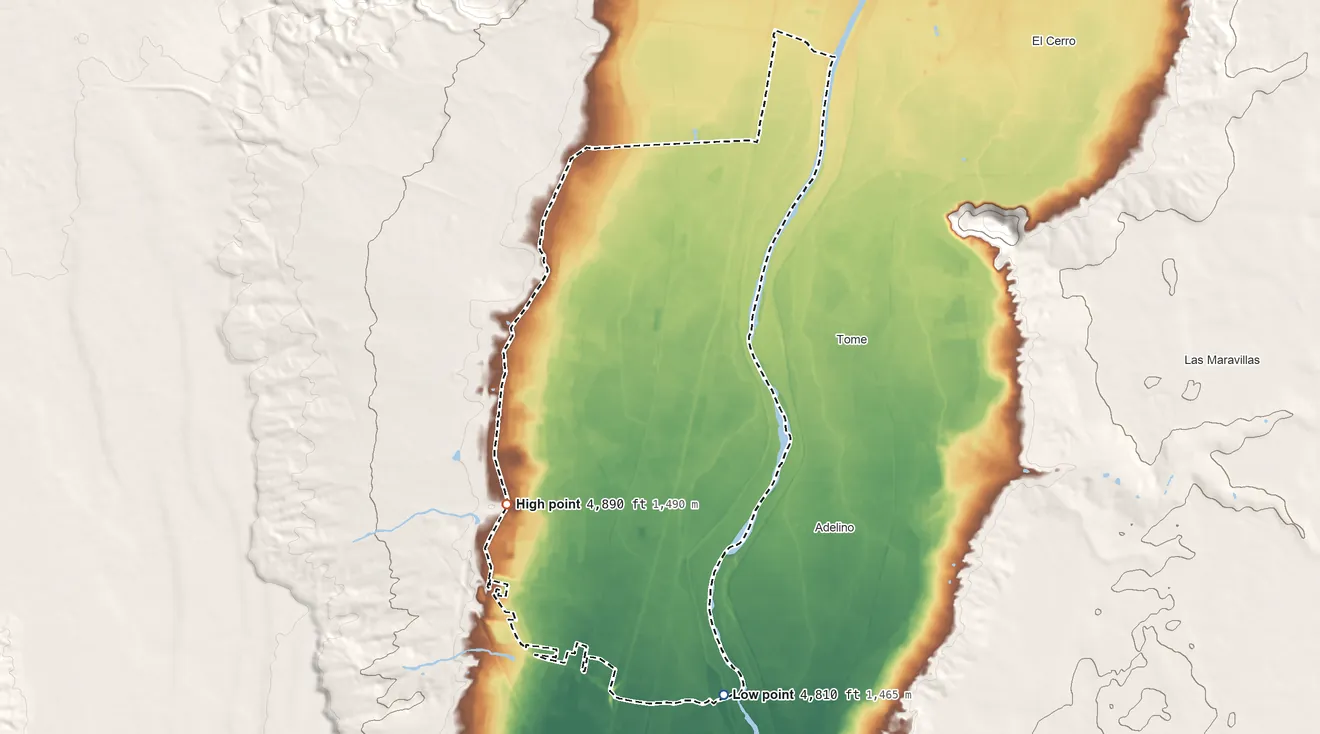 Topographic elevation map of Los Chaves, New Mexico, shaded from 4,810 ft on the south side to 4,890 ft on the southwest side