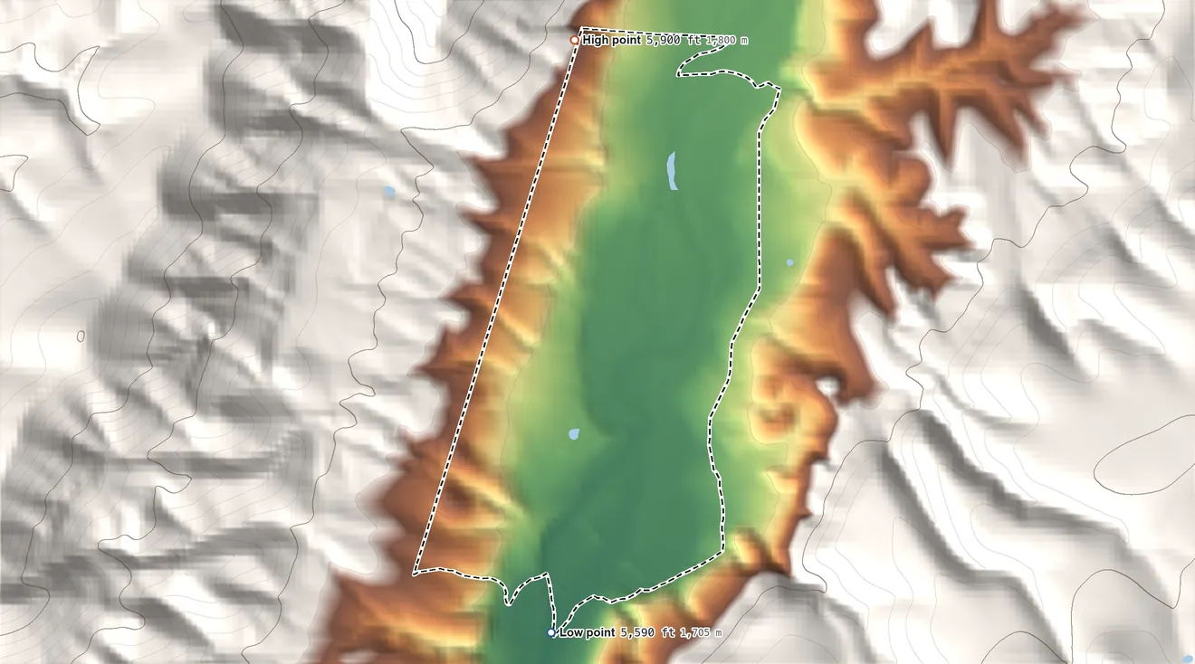 Topographic elevation map of Lower Frisco, New Mexico, shaded from 5,590 ft on the south side to 5,900 ft at the foot of the Saliz Mountains