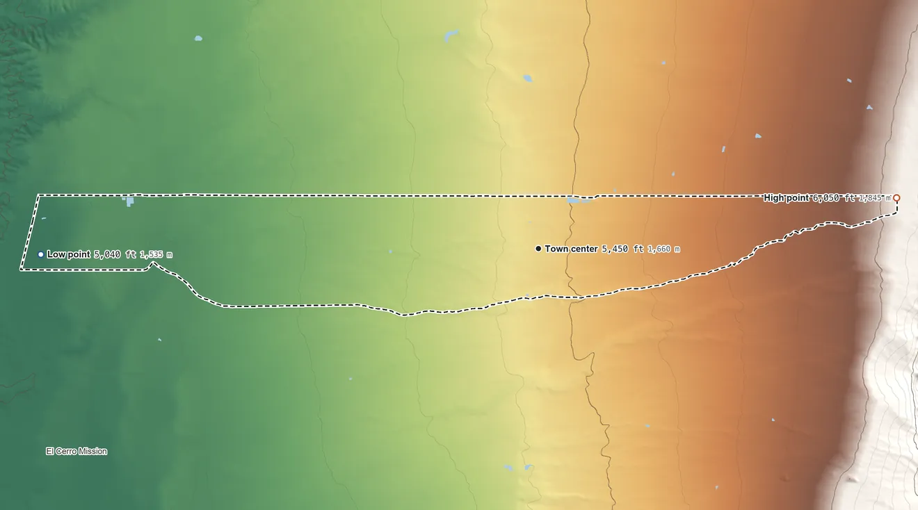Topographic elevation map of Meadow Lake, New Mexico, shaded from 5,040 ft on the west side to 6,050 ft at the foot of the Manzanita Mountains