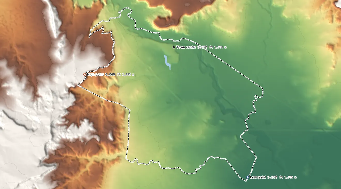 Topographic elevation map of Mesita, New Mexico, shaded from 5,590 ft on the southeast side to 6,060 ft on the west side