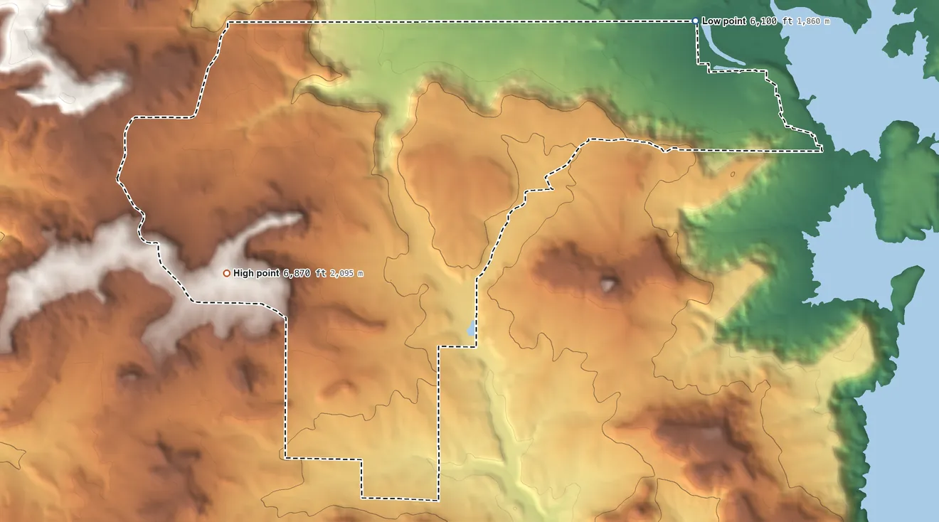 Topographic elevation map of Middle Mesa, New Mexico, shaded from 6,100 ft on the northeast side to 6,870 ft on the southwest side