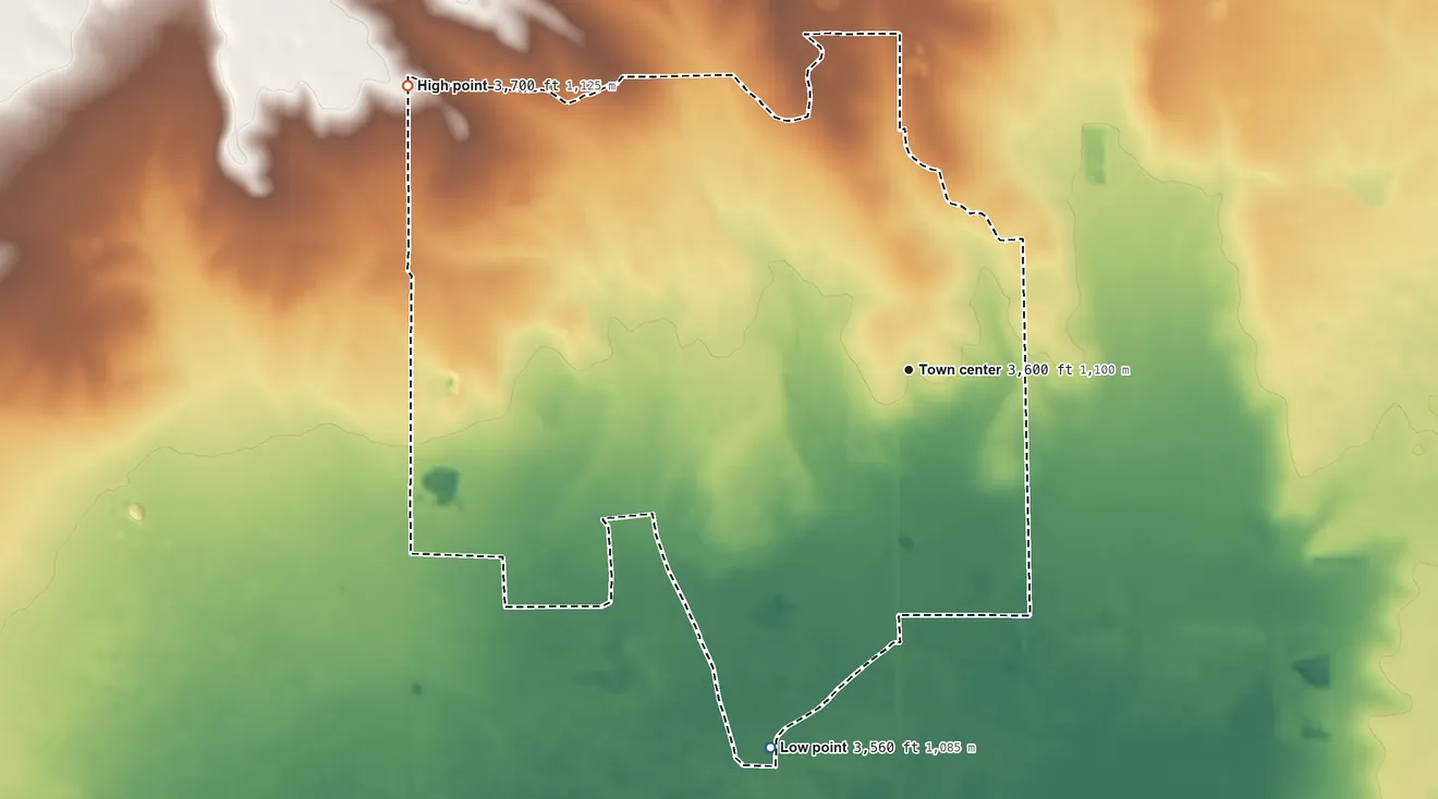 Topographic elevation map of Monument, New Mexico, shaded from 3,560 ft on the south side to 3,700 ft on the northwest side
