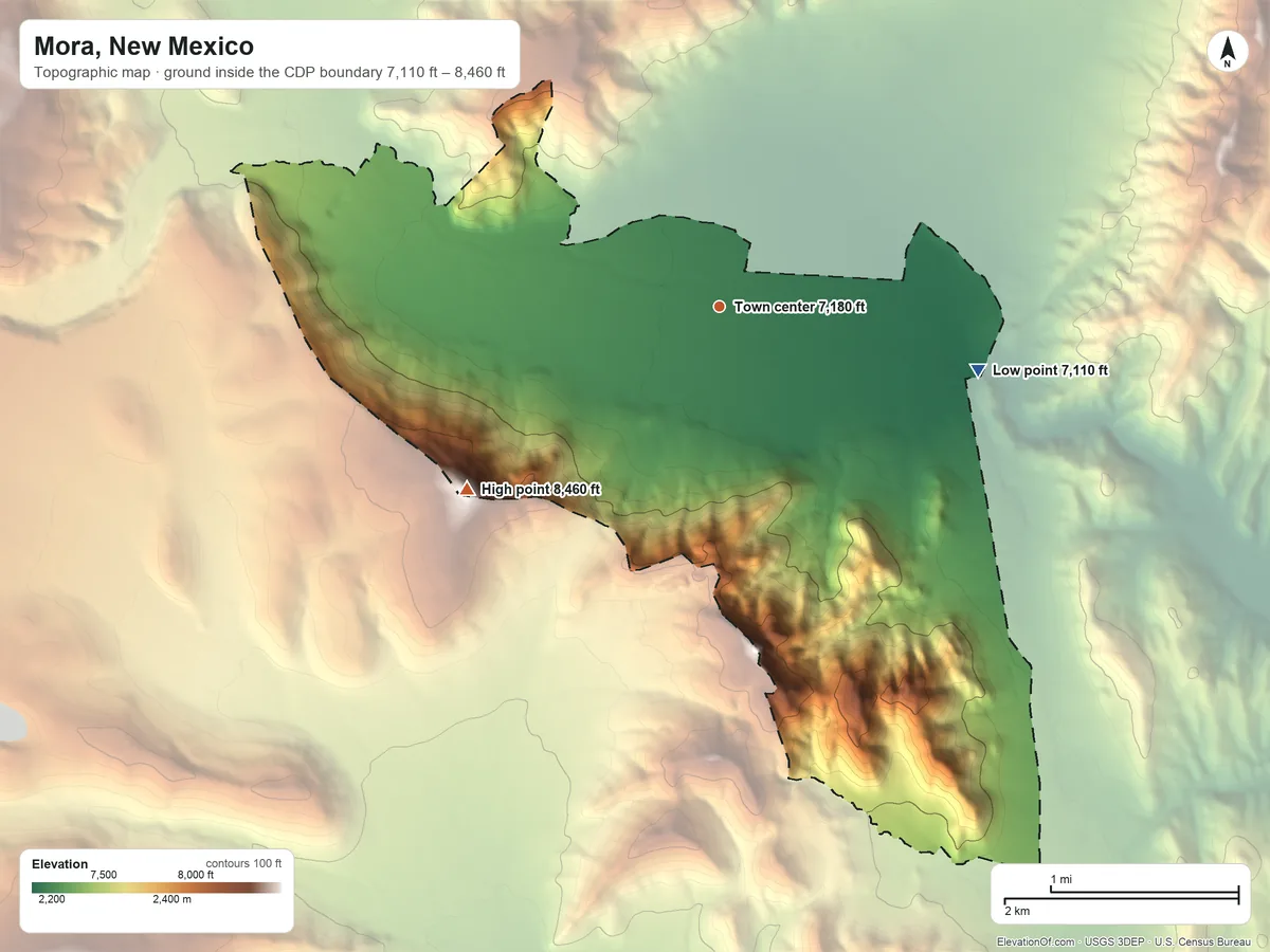Topographic elevation map of Mora, New Mexico, shaded from 7,110 ft on the east side to 8,460 ft on the southwest side