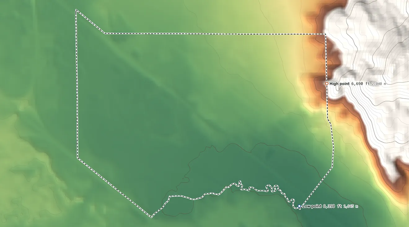 Topographic elevation map of Mount Taylor, New Mexico, shaded from 6,390 ft on the southeast side to 6,690 ft at the foot of the San Mateo Mountains