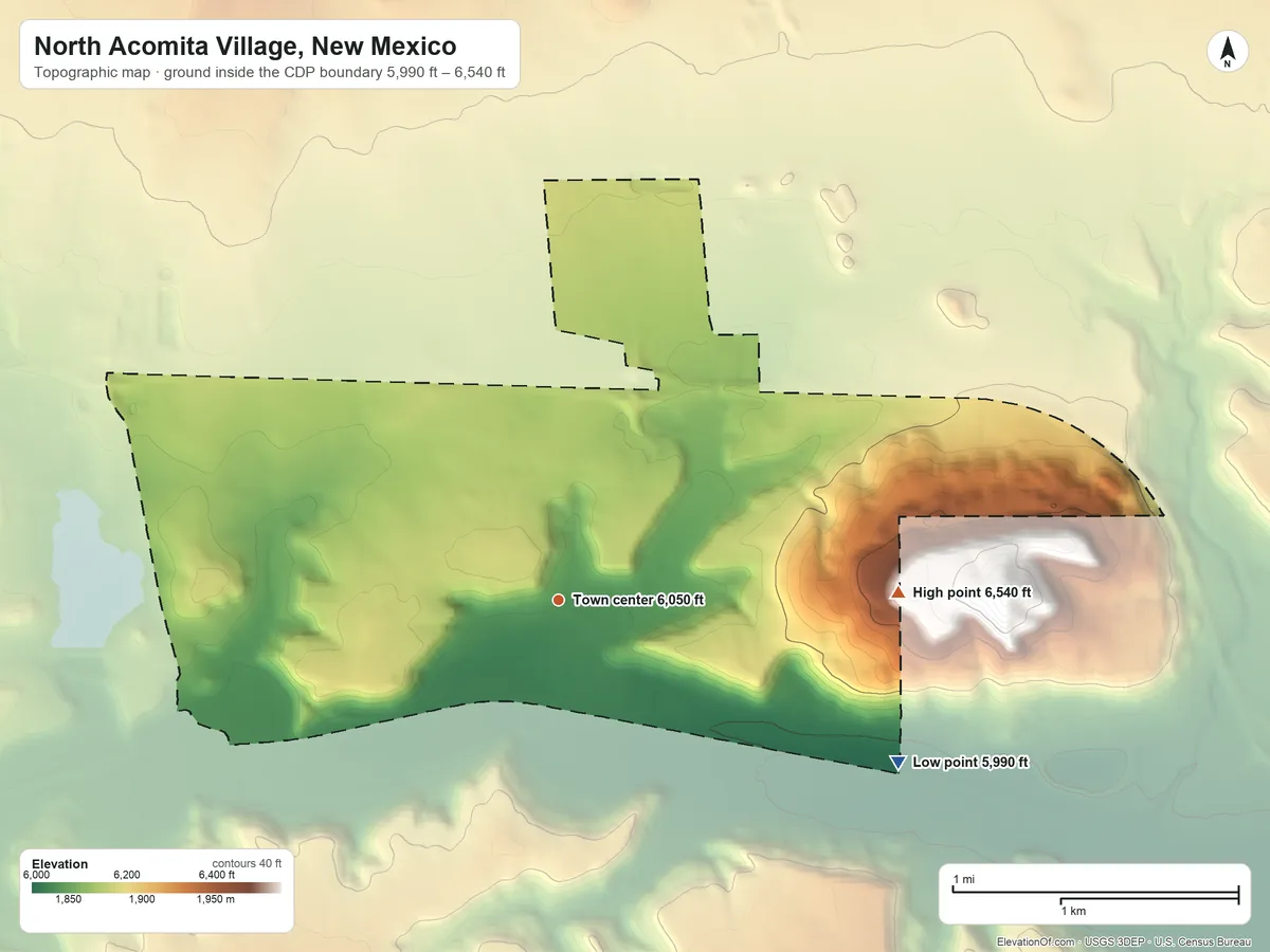 Topographic elevation map of North Acomita Village, New Mexico, shaded from 5,990 ft on the southeast side to 6,540 ft on the east side