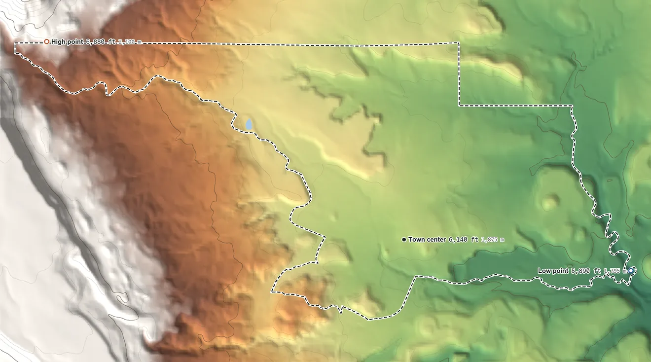 Topographic elevation map of Paguate, New Mexico, shaded from 5,890 ft on the east side to 6,880 ft at the foot of the San Mateo Mountains