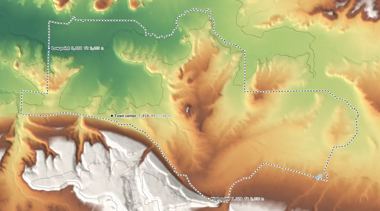Topographic elevation map of Pinedale, New Mexico, shaded from 6,880 ft on the northwest side to 7,320 ft on the southeast edge, below higher ground just outside