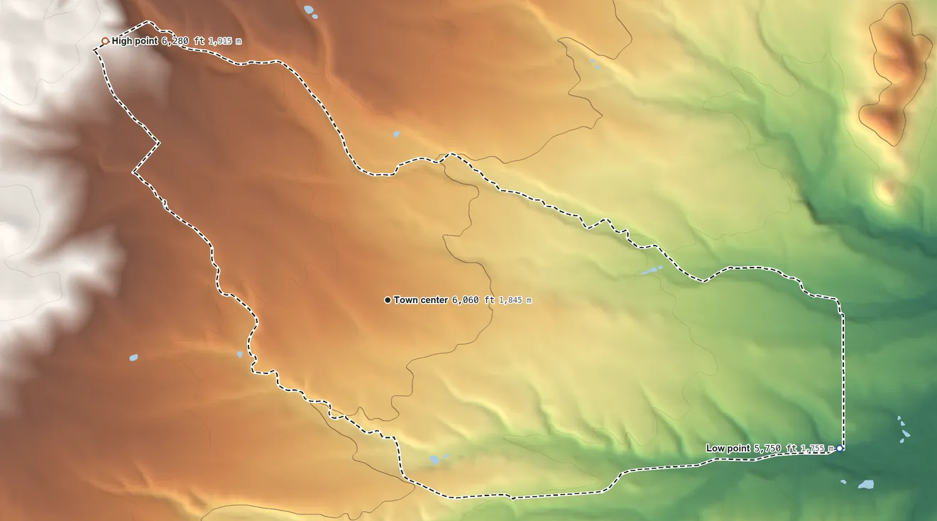 Topographic elevation map of Pinon, New Mexico, shaded from 5,750 ft on the east side to 6,280 ft at the foot of the Collins Hills