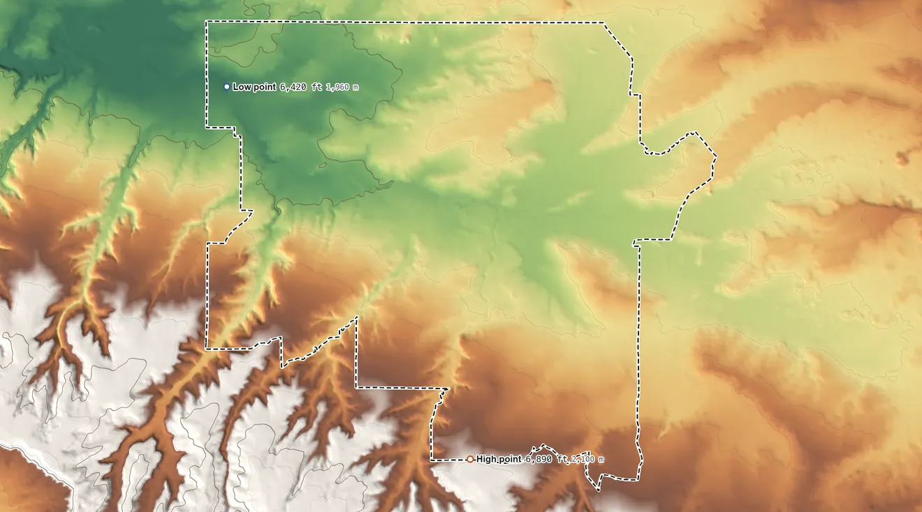 Topographic elevation map of Pueblo Pintado, New Mexico, shaded from 6,420 ft on the northwest side to 6,890 ft on the southeast side