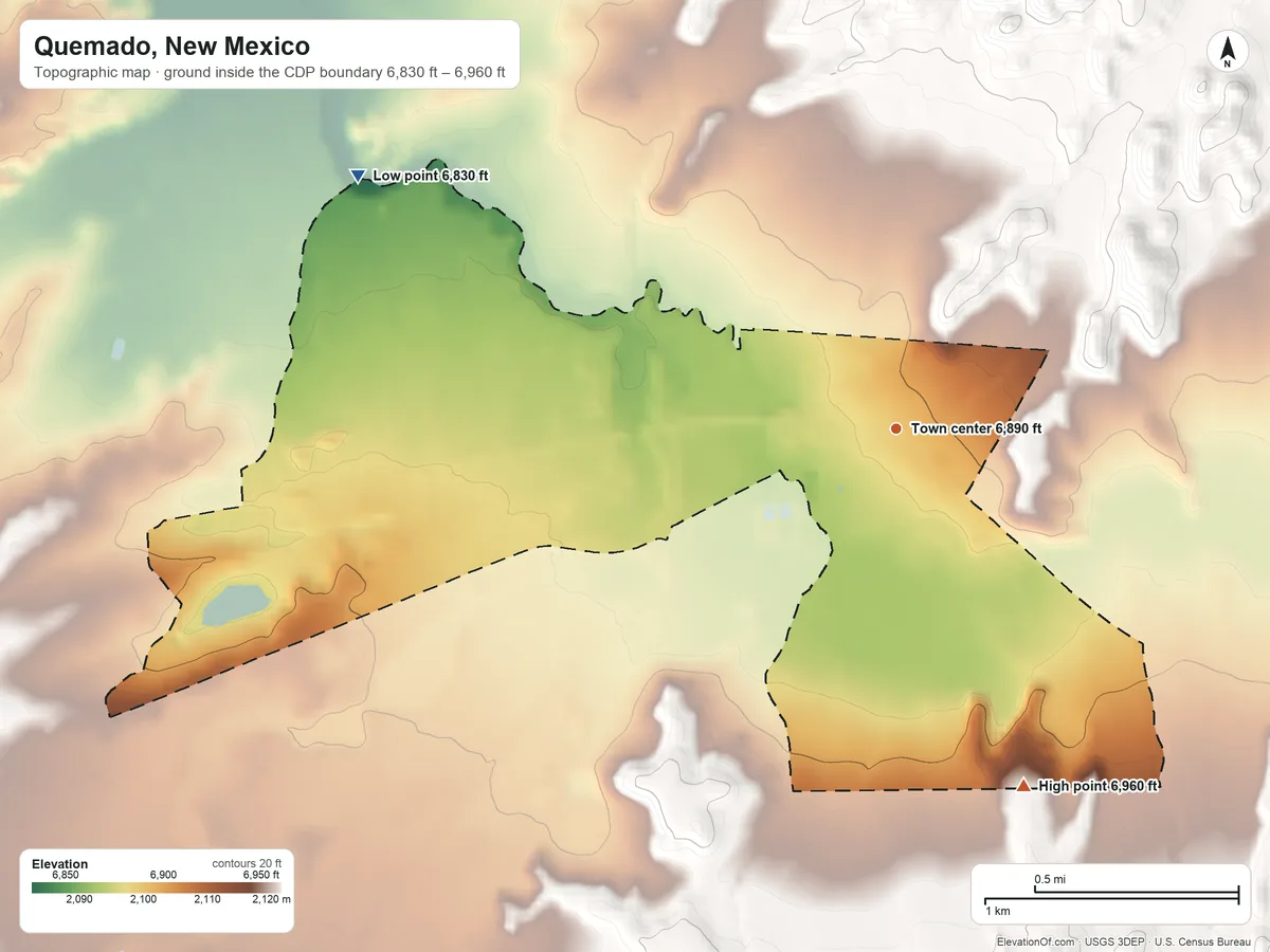 Topographic elevation map of Quemado, New Mexico, shaded from 6,830 ft on the northwest side to 6,960 ft on the south edge, below higher ground just outside