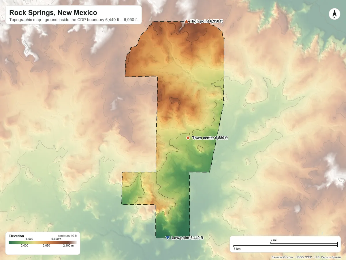Topographic elevation map of Rock Springs, New Mexico, shaded from 6,440 ft on the south side to 6,950 ft on the north side