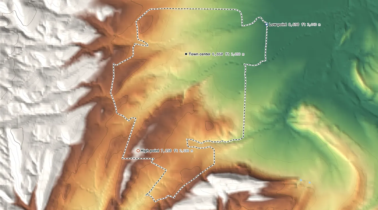 Topographic elevation map of San Antonito, New Mexico, shaded from 6,690 ft on the east side to 7,150 ft at the foot of the Sandia Mountains