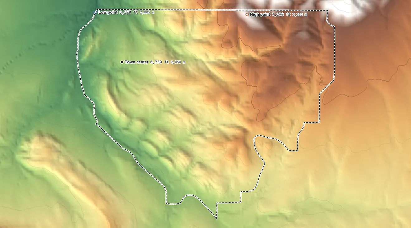 Topographic elevation map of Sandia Knolls, New Mexico, shaded from 6,570 ft on the northwest side to 7,270 ft at the foot of the San Pedro Mountains
