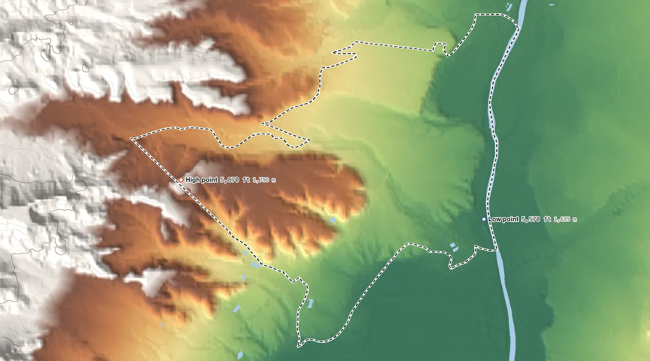 Topographic elevation map of Santa Clara Pueblo, New Mexico, shaded from 5,570 ft on the southeast side to 5,870 ft on the west edge, below higher ground just outside