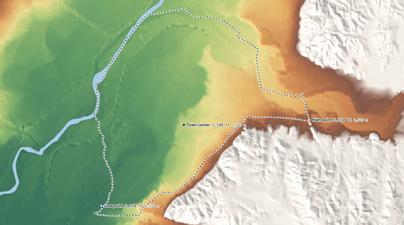 Topographic elevation map of Santo Domingo Pueblo, New Mexico, shaded from 5,160 ft on the southwest side to 5,260 ft on the east side
