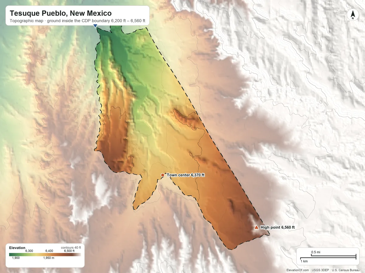 Topographic elevation map of Tesuque Pueblo, New Mexico, shaded from 6,200 ft on the northwest side to 6,560 ft on the southeast edge, below higher ground just outside