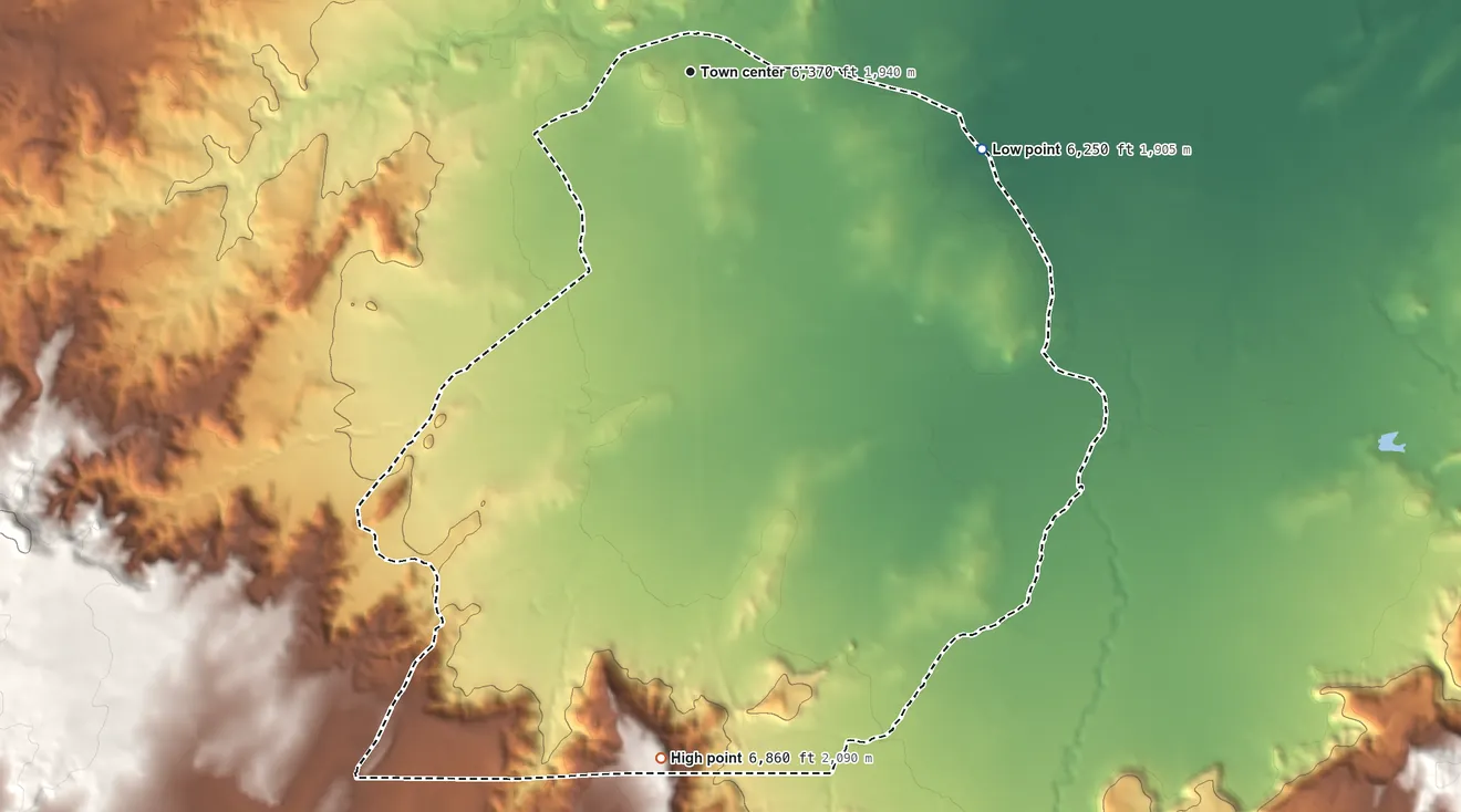 Topographic elevation map of Twin Lakes, New Mexico, shaded from 6,250 ft on the east side to 6,860 ft on the south side